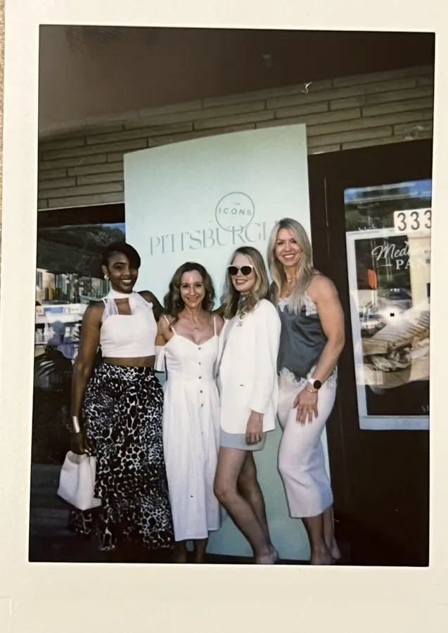 Four ICONS members posing together at the ICONS of Pittsburgh step-and-repeat