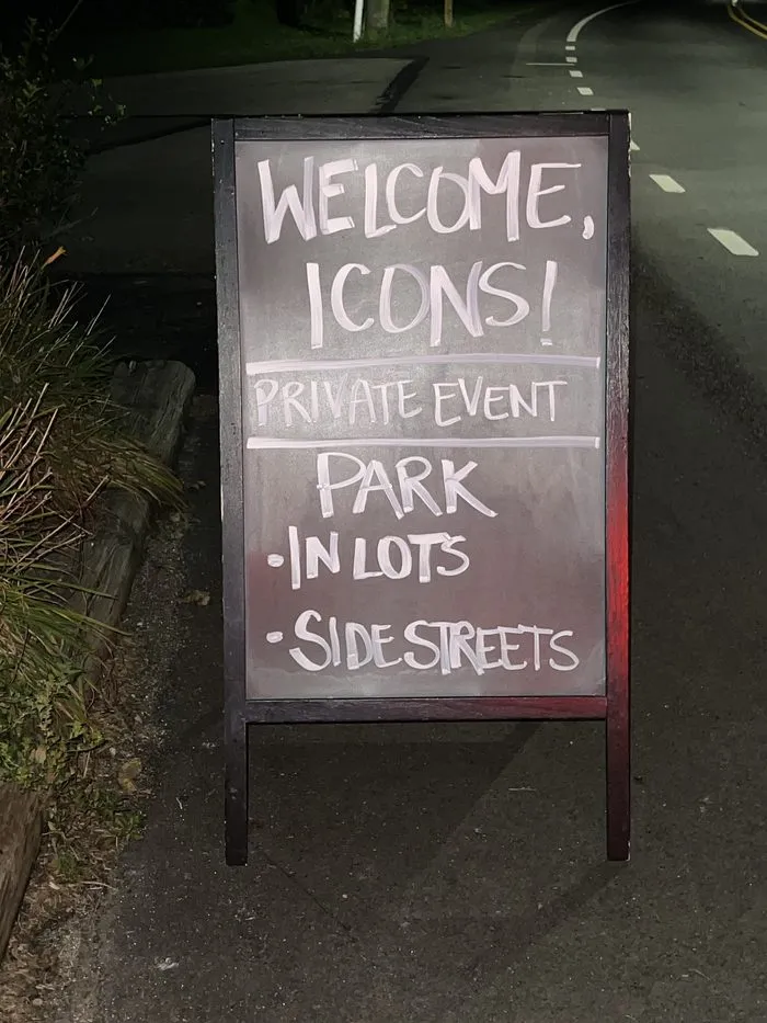 A welcome sign reading Welcome, Icons! outside the Station No. 5 event